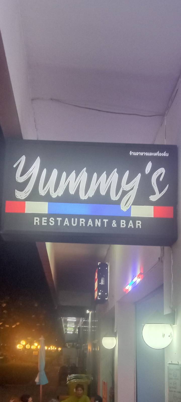 Yummy's restaurant and bar in Jomtien pattaya thailand, sign close up