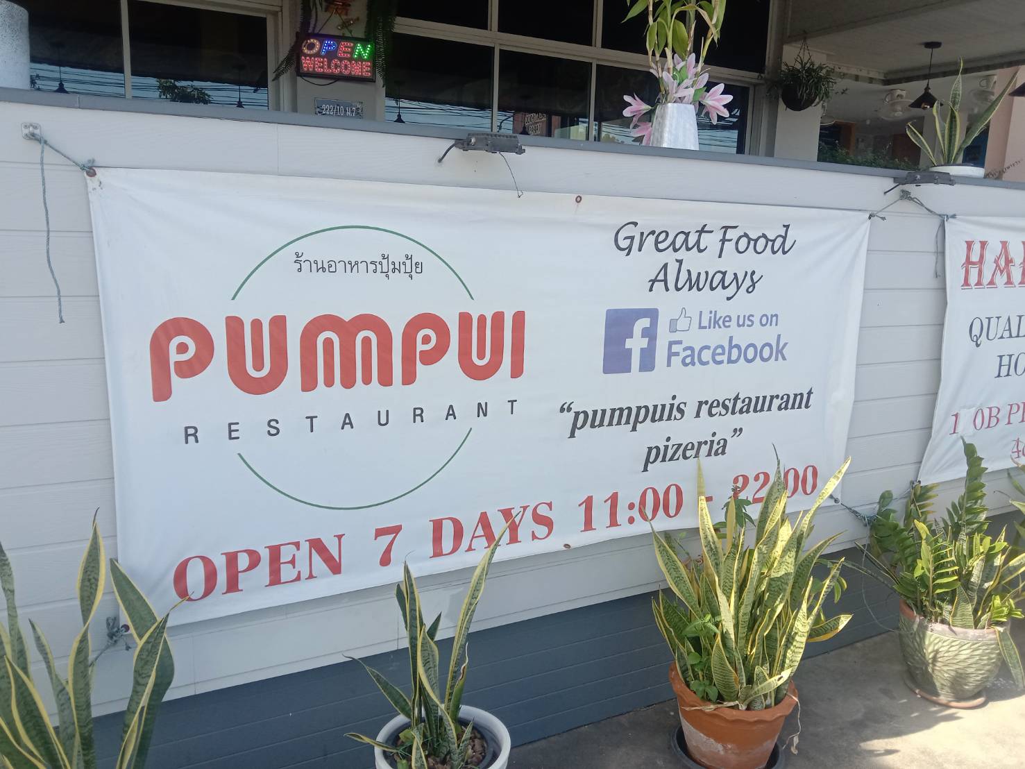 Pumpui pizza restaurant in soi countryclub Pattaya, publicity bord