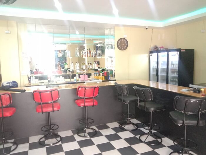 Golden view, guesthouse, restaurant and bar in Jomtien Pattaya, black and white bar corner