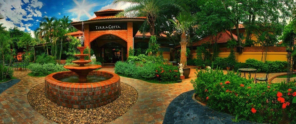 Terracotta restaurant & bike stop cafe in Pattaya,  garden and restaurant with the fontain