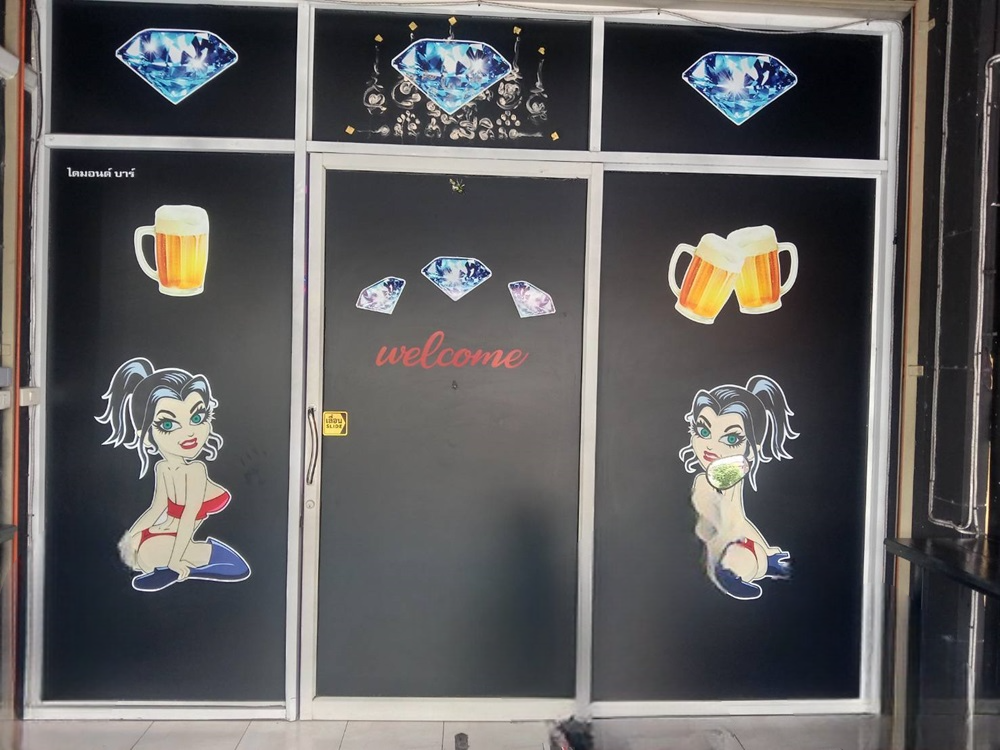 Diamond Bar Darkside, decorated entrance doors, with cartoons of girls and diamonds